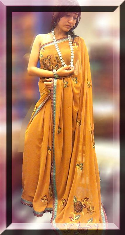 Mustard original georgette saree with petch and hand intrication.(icon2)