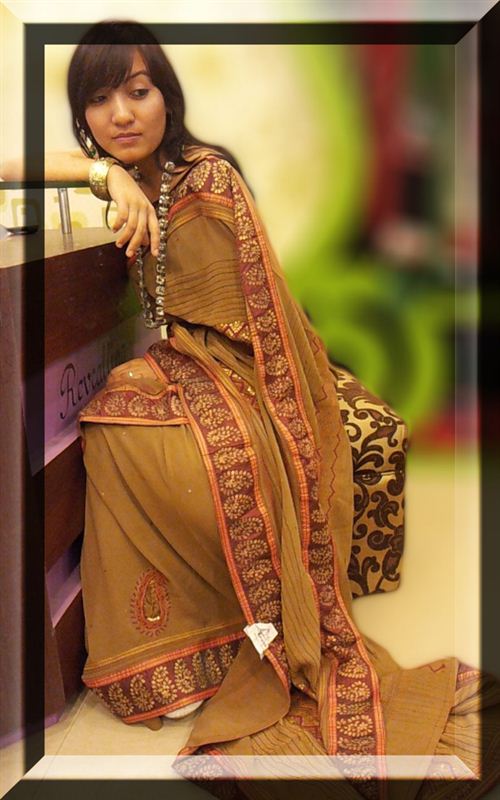 Brown color original georgette saree with shower border and heat work.(icon4)
