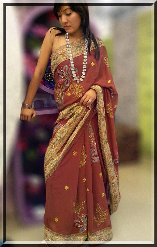 Chocolate color original georgette saree with antique and thread work.(icon15)