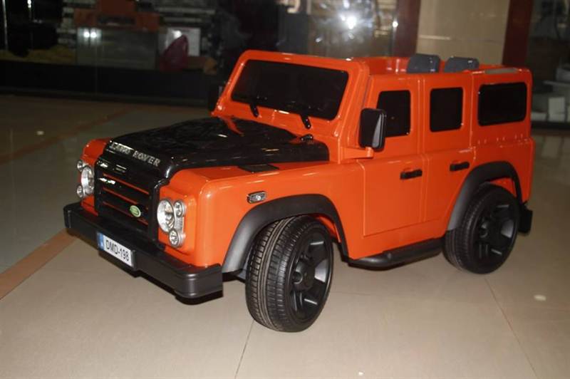 Ride on land Rover defender wrangler in orange