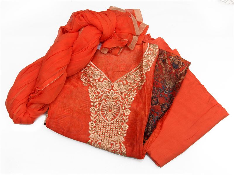 Chinon silk kurta with embroidery work around the neck. Printed salwar and plain chiffon shawl - NivaKurta1-1