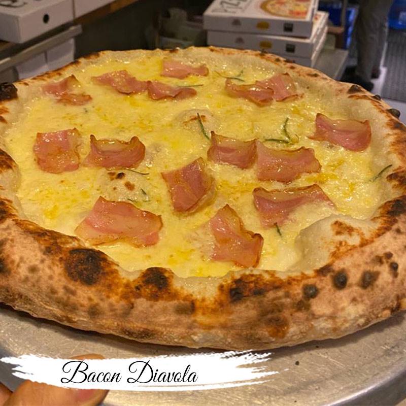 Bacon Diavola Pizza (Large size) from RoadHouse Cafe (PKR)