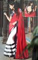 Eye catching saree in red and white with black sequine patti for better gift.(n114)