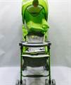 Green colored baby stroller