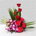 4 Roses, 4 Carnations and 6 Orchids by FNP