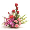 4 Roses, 4 Carnations, 6 Orchids with Teddy in a Basket by FNP